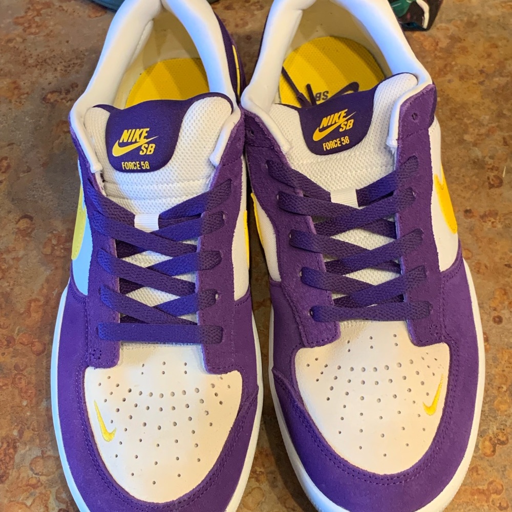 Purple and Gold Nike SB.  Worn ONCE.